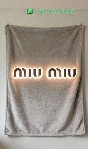 Miumiu Throw Blankets